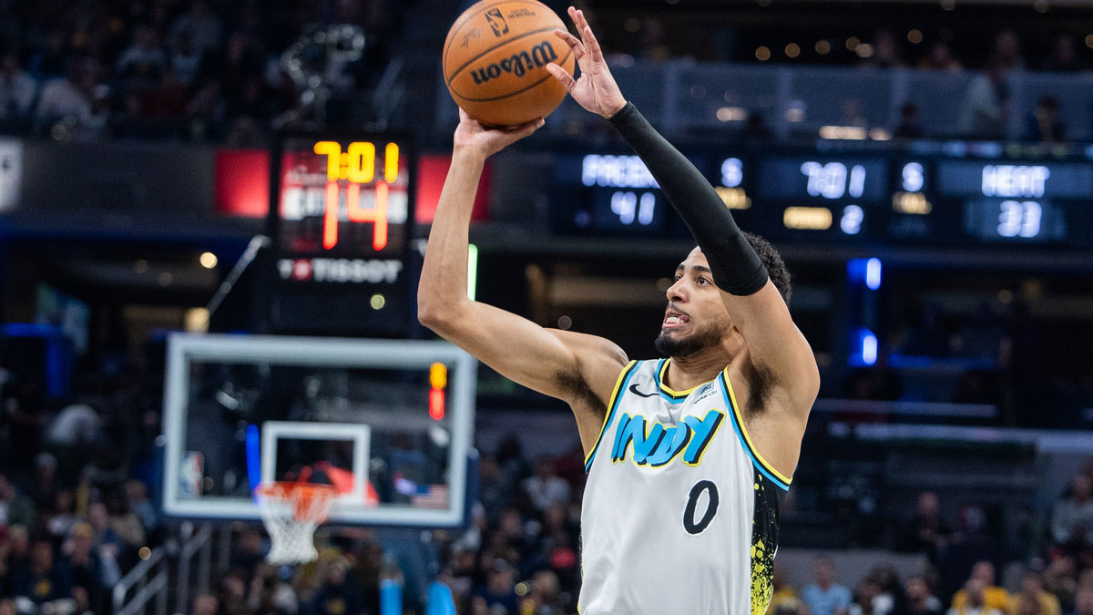 Indiana Pacers guard Tyrese Haliburton (0) shoots the ball in the first half against the Miami Heat at Gainbridge Fieldhouse. 