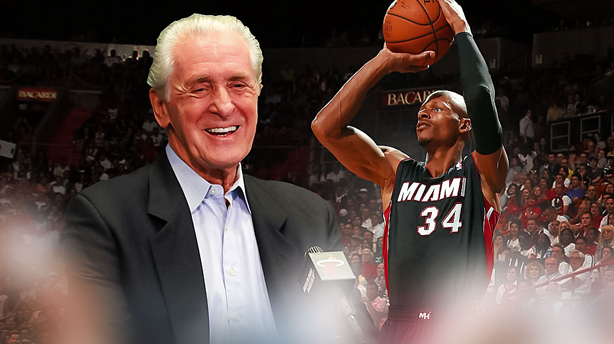 Pat Riley with a smile on his face and Ray Allen next to him, shooting the ball in a Miami Heat jersey