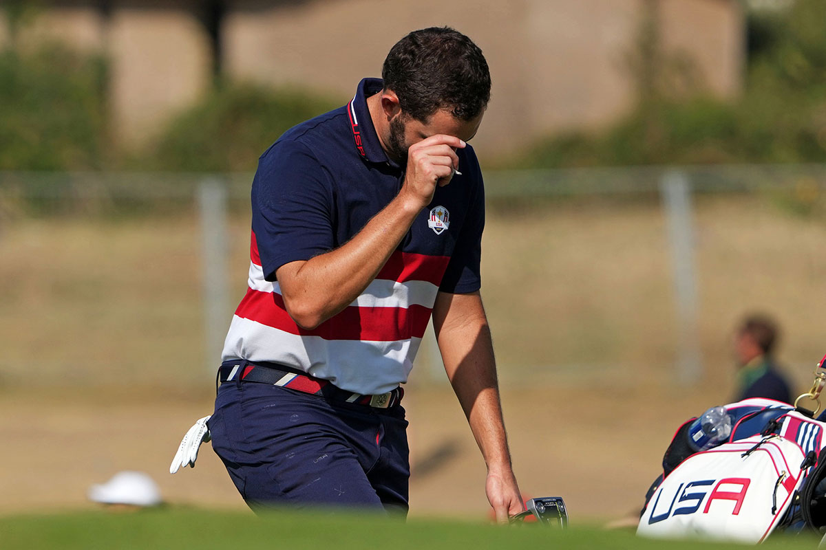 Team USA golfer Patrick Cantlay acknowledges the gallery on the 15th hole during the final day of the 44th Ryder Cup golf competition at Marco Simone Golf and Country Club