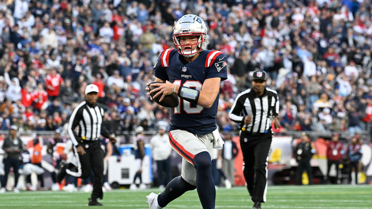 New England Patriots quarterback Drake Maye (10) runs the ball against the Los Angeles Rams during the second half at Gillette Stadium. 