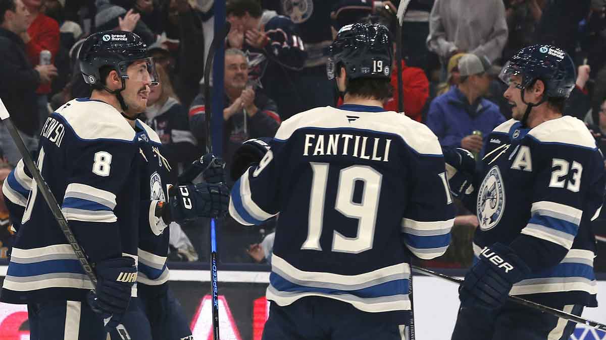 Columbus Blue Jackets defenseman Zach Werenski (8) celebrates his goal against the Pittsburgh Penguins during the first period at Nationwide Arena.