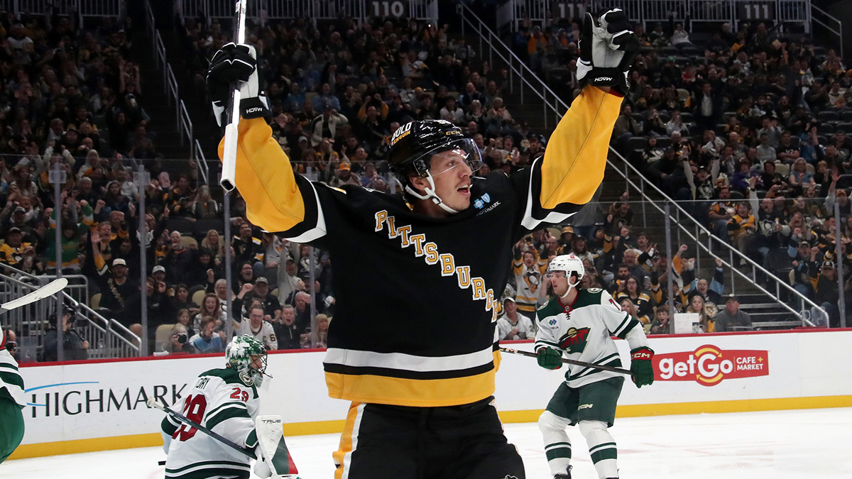 Pittsburgh Penguins right wing Rickard Rakell (67) reacts after scoring his second goal of the game against Minnesota Wild goaltender Marc-Andre Fleury (29) during the third period at PPG Paints Arena.