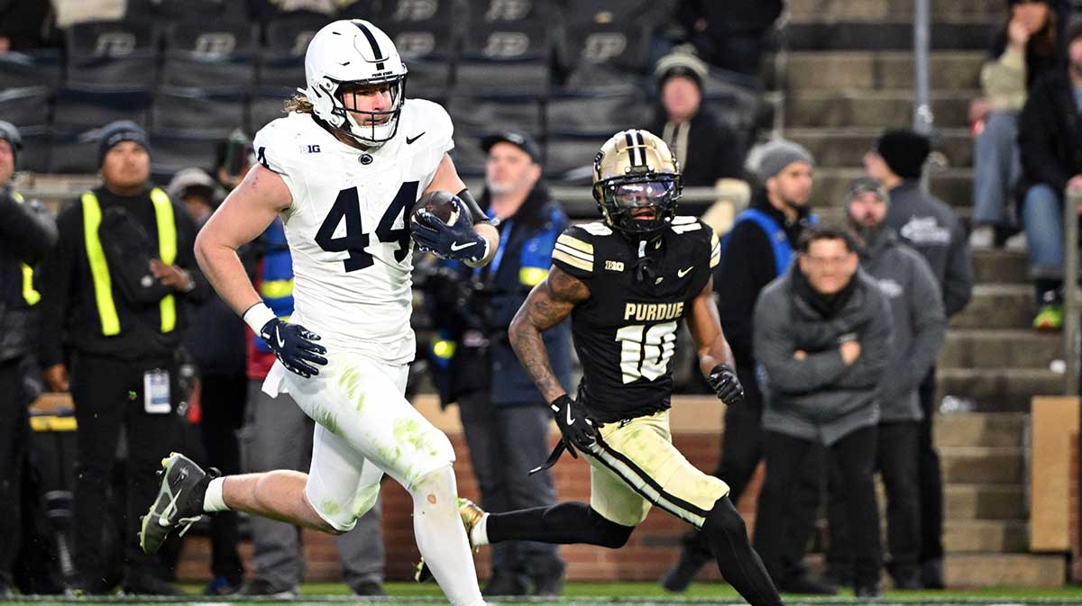 Penn State Nittany Lions tight end Tyler Warren (44) runs the ball in front of Purdue Boilermakers defensive back Kyndrich Breedlove (10) during the second half at Ross-Ade Stadium.