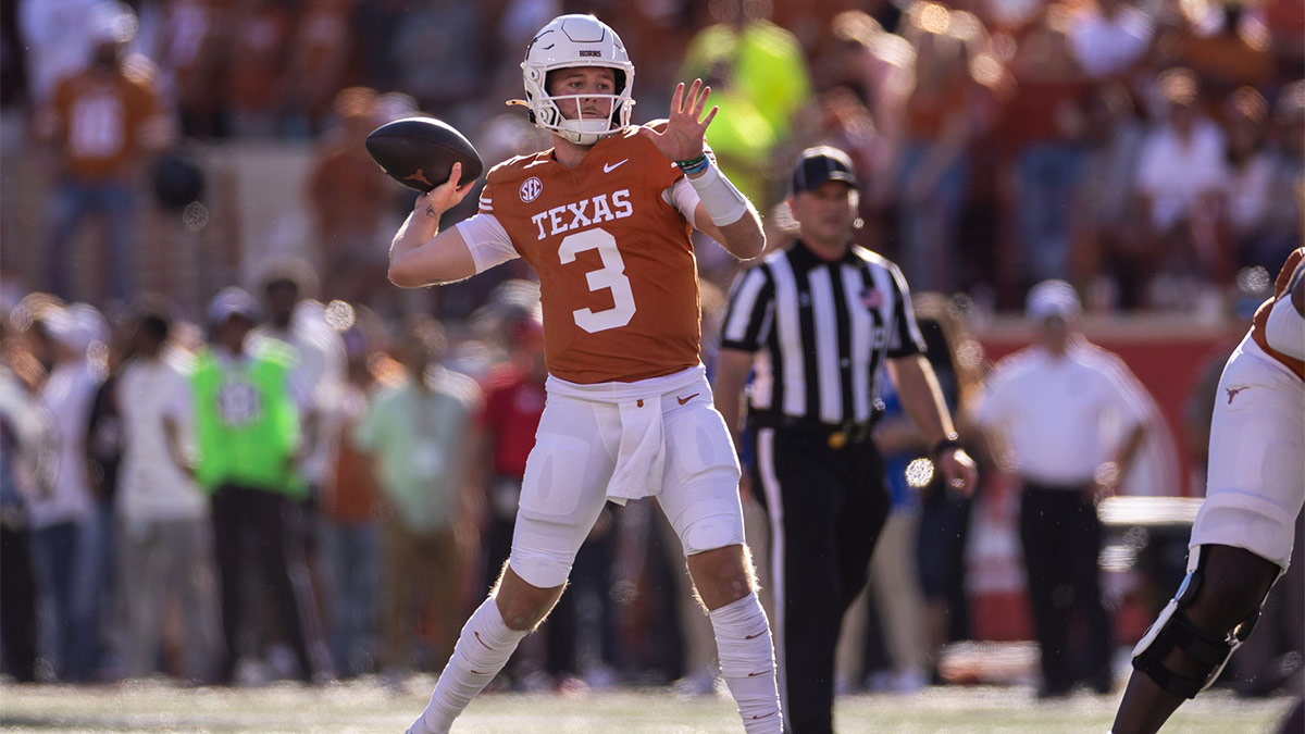 Nov 23, 2024; Austin, Texas, USA; Texas Longhorns quarterback Quinn Ewers (3) throws against the Kentucky Wildcats during the first quarter at Darrell K Royal-Texas Memorial Stadium. Mandatory Credit: Brett Patzke-Imagn Images