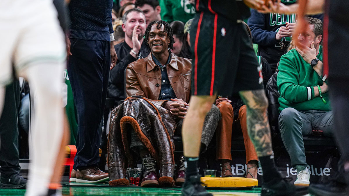 Former Boston Celtics player Rajon Rondo on the sideline as the Celtics take on the Detroit Pistons in the second half at TD Garden. 