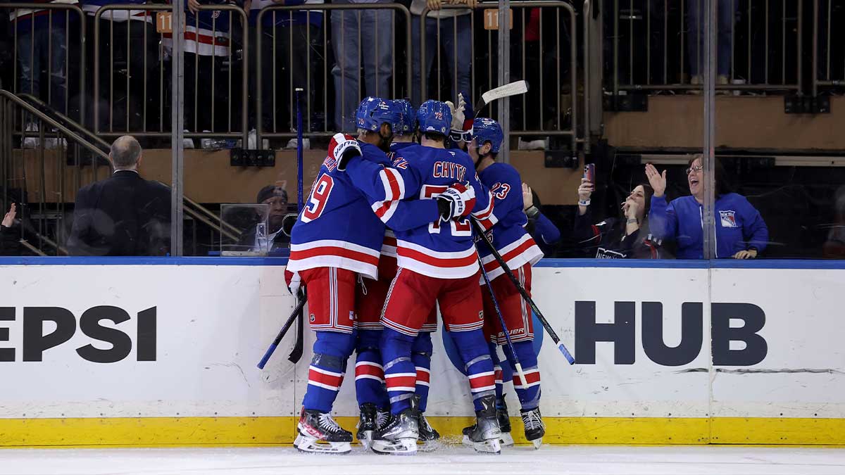 New York Rangers players celebrate a goal against the Anaheim Ducks by Will Cuylle (50) during the third period at Madison Square Garden.