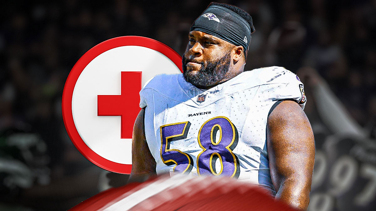 Michael Pierce in a Baltimore Ravens uniform with a red and white first aid symbol as Pierce could return from injury soon as the ravens prepare to face the eagles in week 13.