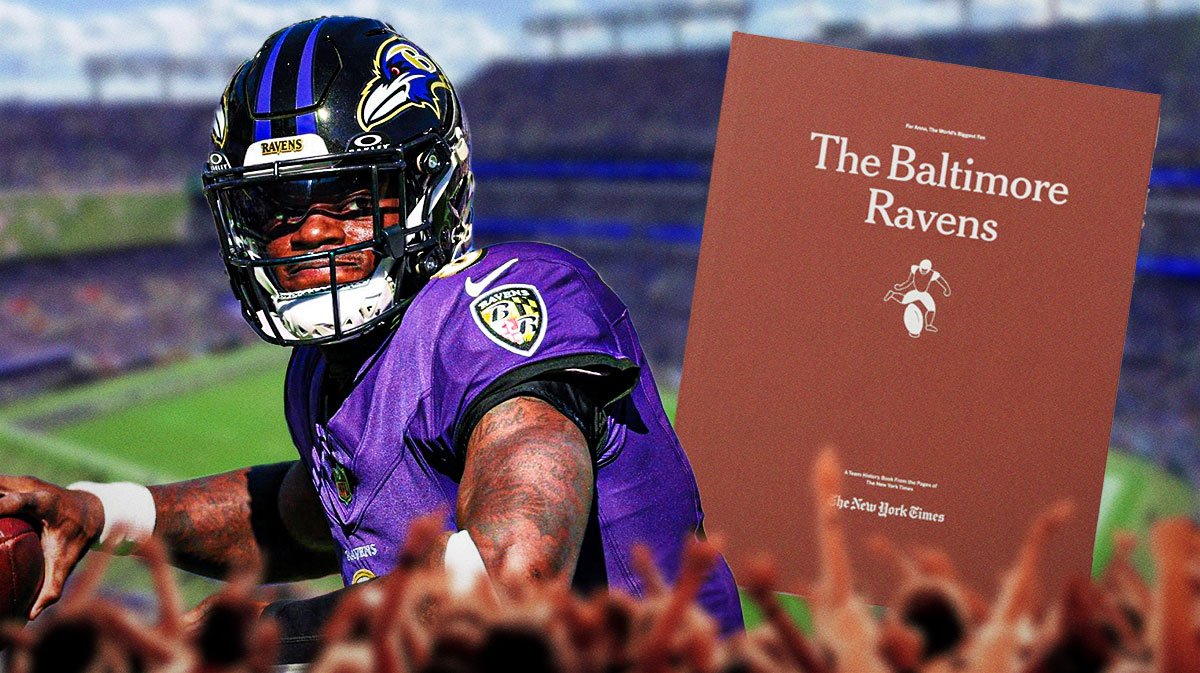 Ravens QB Lamar Jackson with a Ravens record book next to him in M&T Bank Stadium