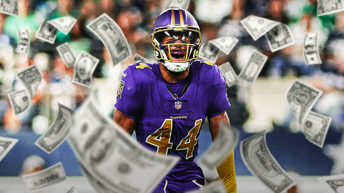 Marlon Humphrey in a Baltimore Ravens uniform with $100 bills all around as Humphrey was fined twice by the NFL from infractions in the Bengals game as the ravens prepare for week 11 against the steelers.