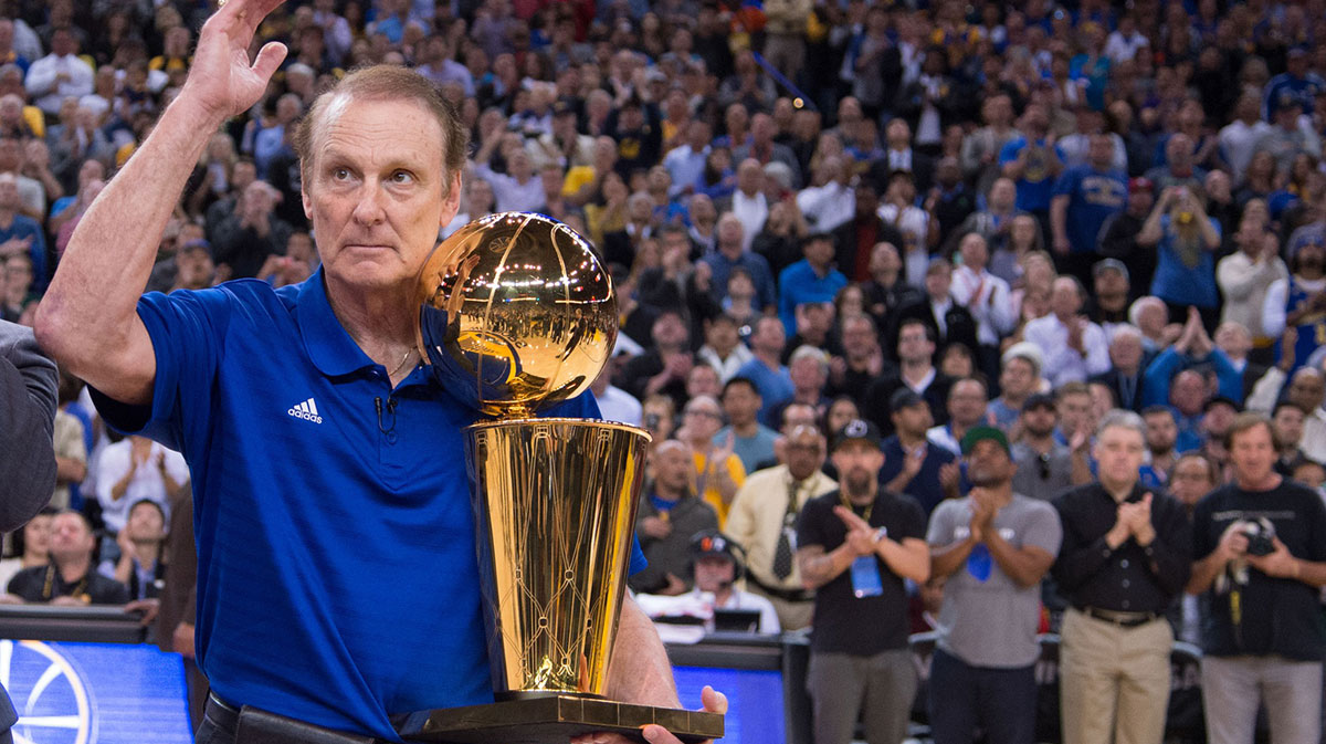 Golden State Warriors former player Rick Barry holds the 1975 NBA Championship trophy during a 40th anniversary celebration during the game against the Washington Wizards at Oracle Arena.