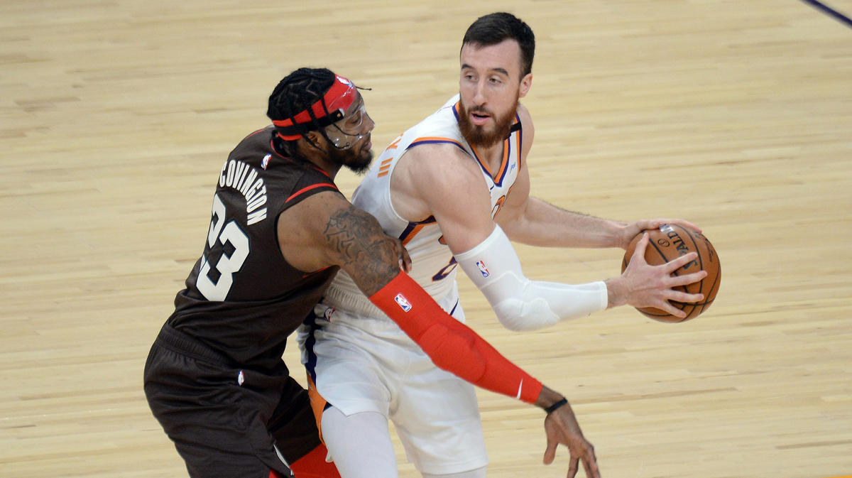 Portland Trail Blazers forward Robert Covington (23) guards Phoenix Suns forward Frank Kaminsky (8) during the second half at Phoenix Suns Arena. 