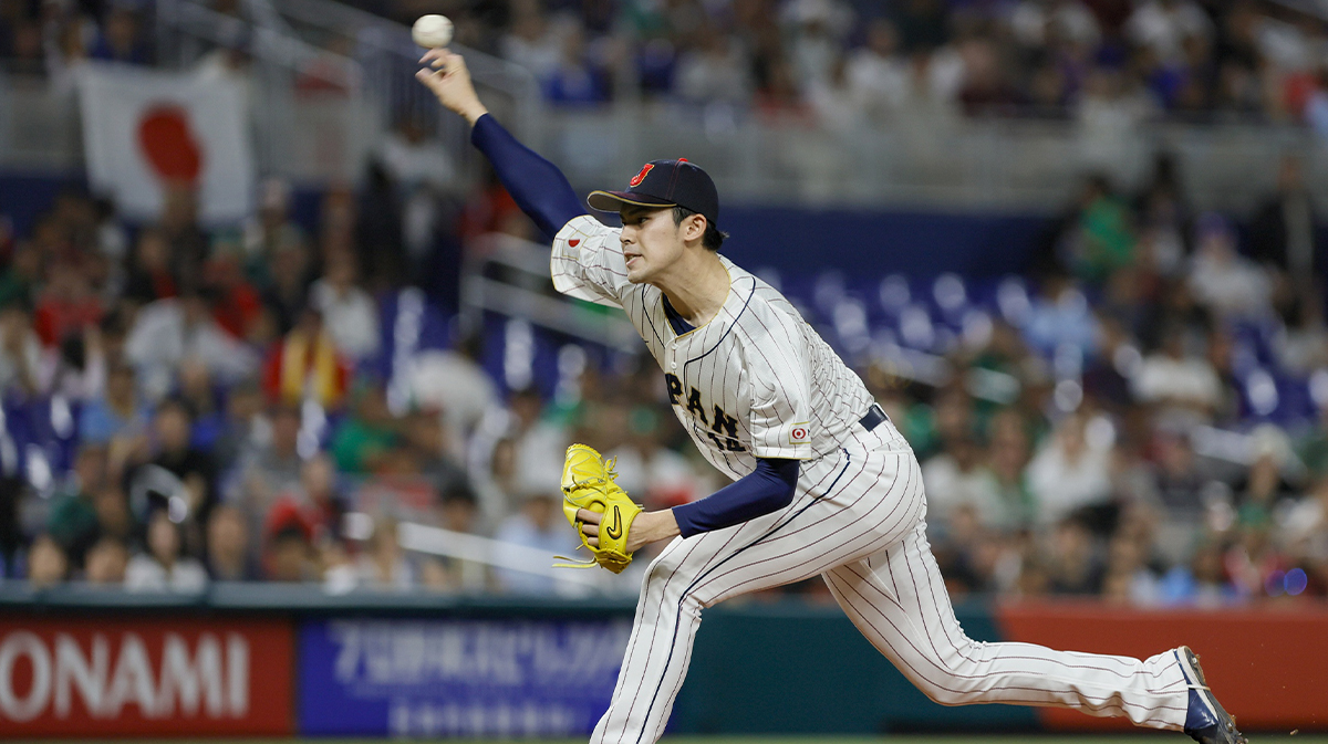 Japan starting pitcher Roki Sasaki (14) delivers a pitch during the first inning against Mexico at LoanDepot Park. 