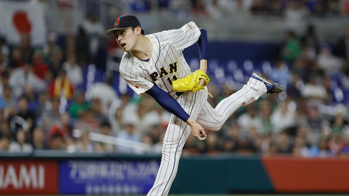 Japan starting pitcher Roki Sasaki (14) delivers a pitch during the first inning against Mexico at LoanDepot Park.