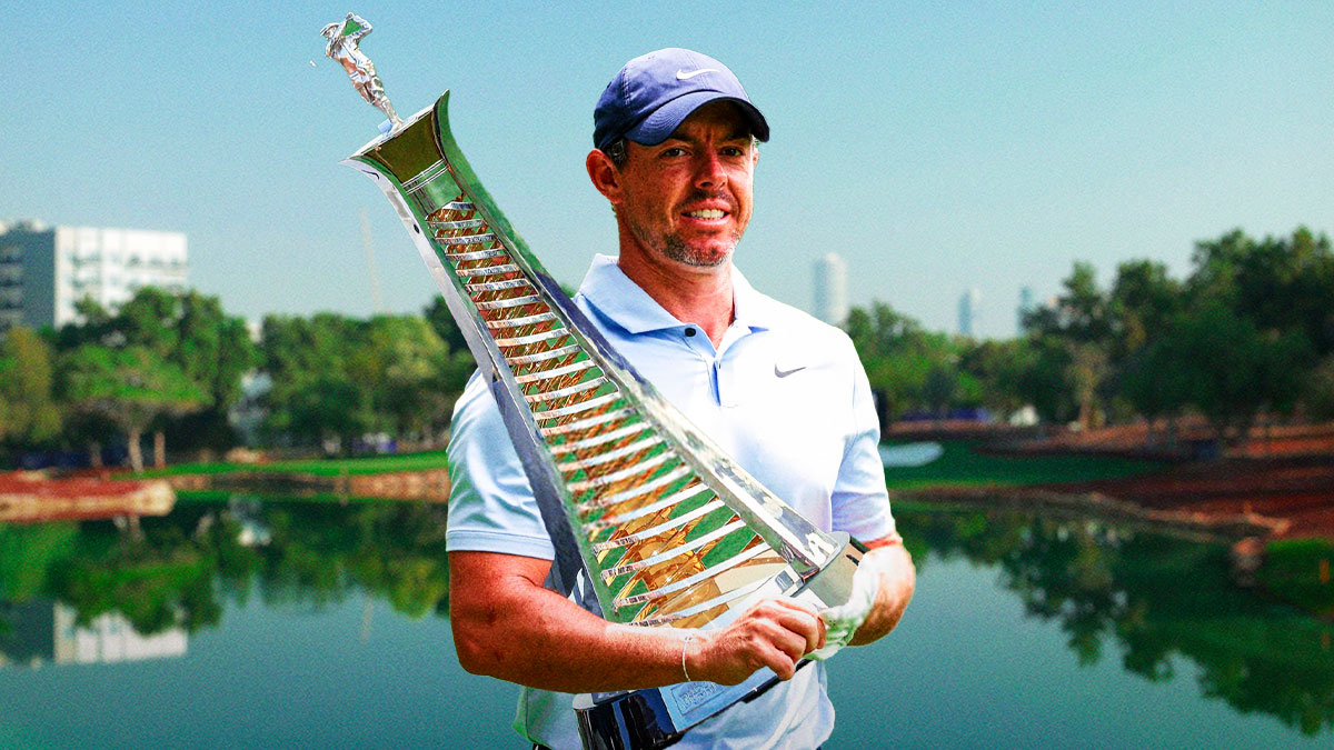 rory mcilroy holding a trophy