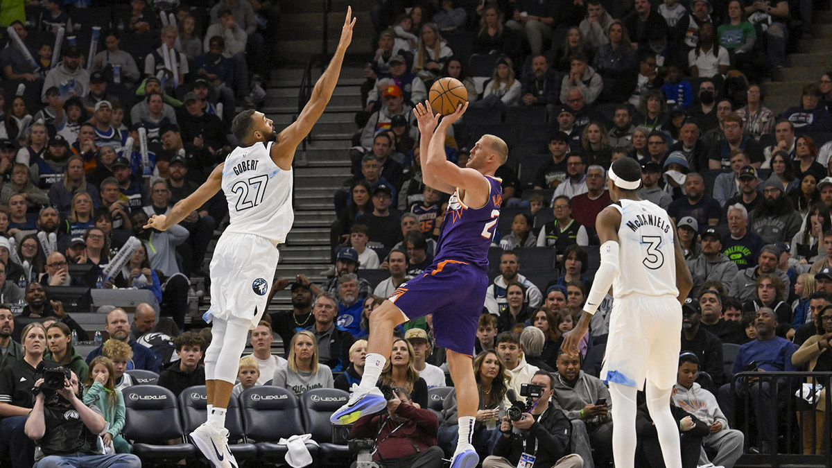 Minnesota Timberwolves center Rudy Gobert (27) contests the shot of Phoenix Suns center Mason Plumlee (22) during the third quarter at Target Center.