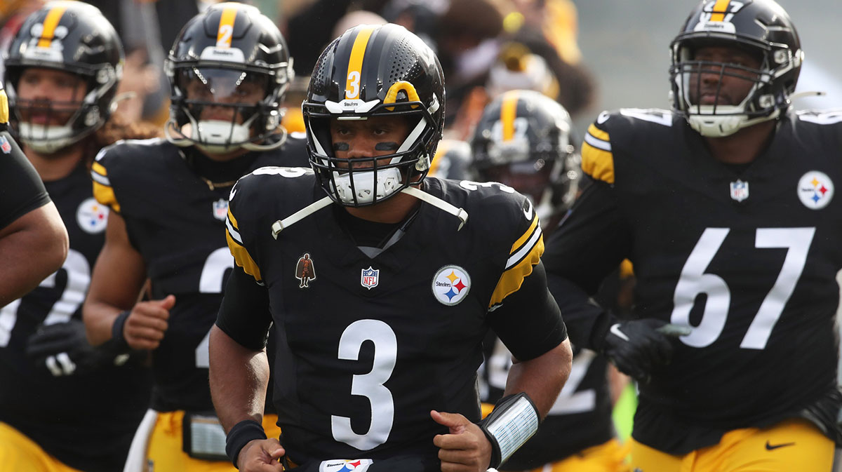 Pittsburgh Steelers quarterback Russell Wilson (3) leads the team onto the field to play the Baltimore Ravens at Acrisure Stadium. 