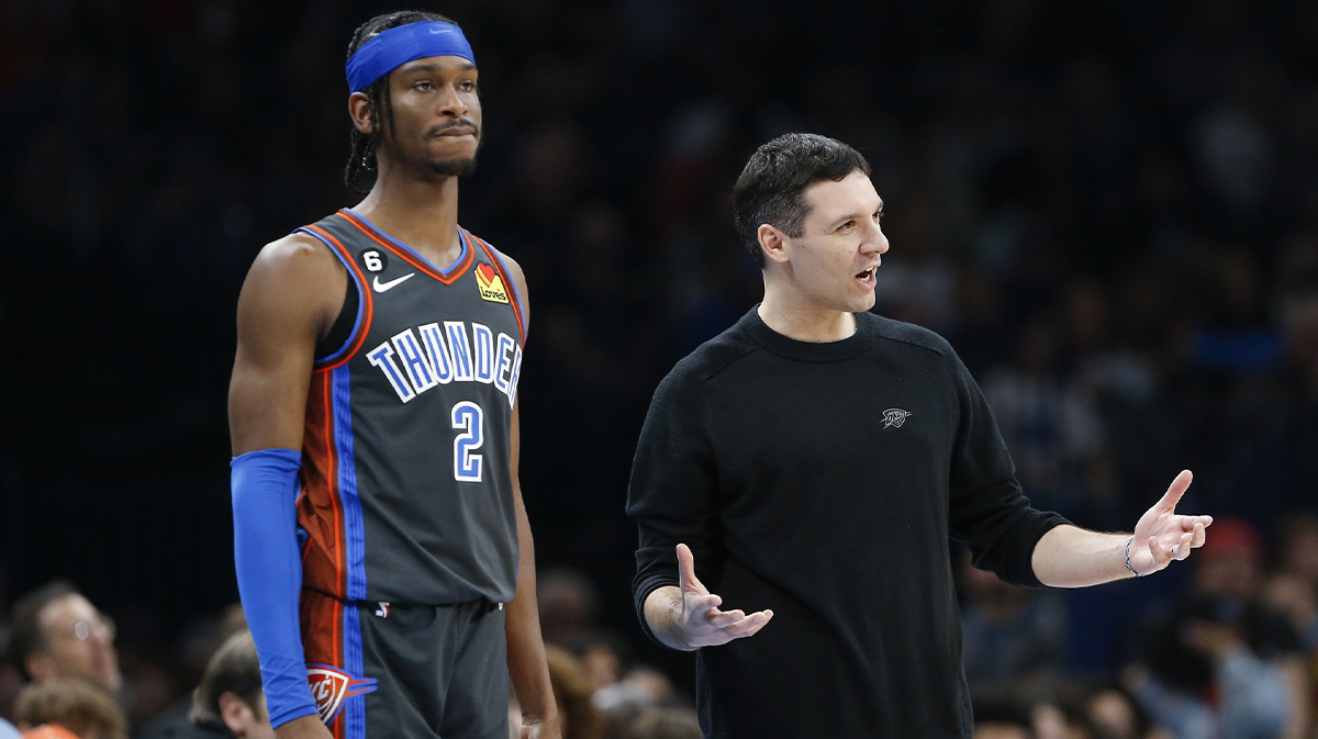 Oklahoma City Thunder guard Shai Gilgeous-Alexander (2) and head coach Mark Daigneault watch their team play against the Washington Wizards during the second half at Paycom Center.