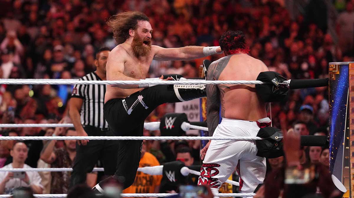 Sami Zayn delivering a Helluva Kick to Jey Uso in the main event of WrestleMania 39 Night 1.