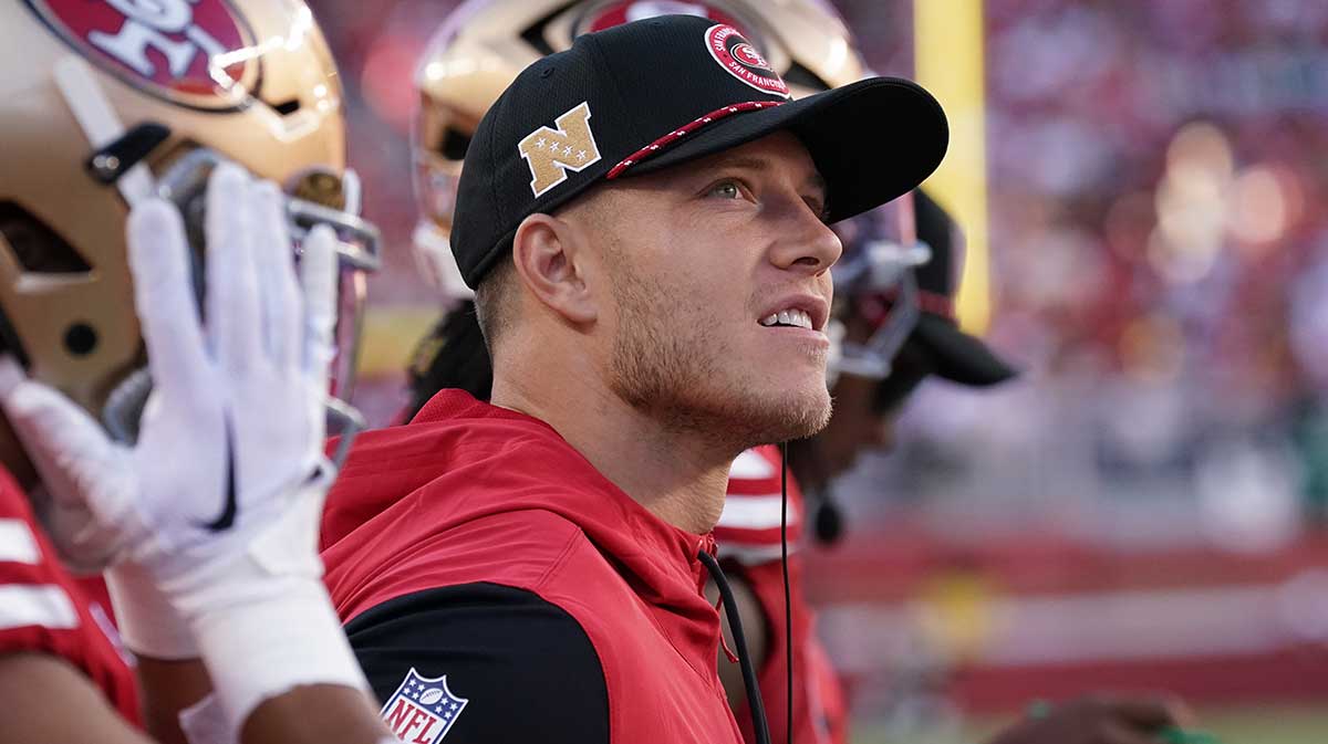 San Francisco 49ers running back Christian McCaffrey (23) watches injured from the sidelines in the second quarter against the New York Jets at Levi's Stadium.