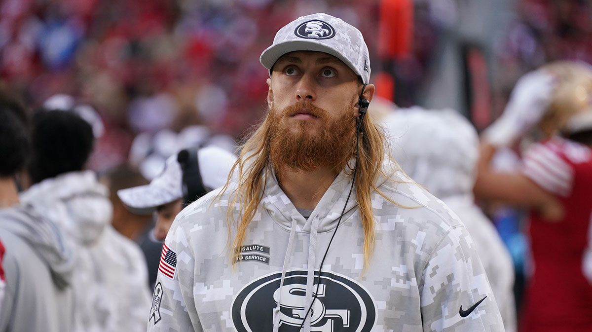 George Kittle stands on the sideline with injury against the Seattle Seahawks in the fourth quarter at Levi's Stadium. 