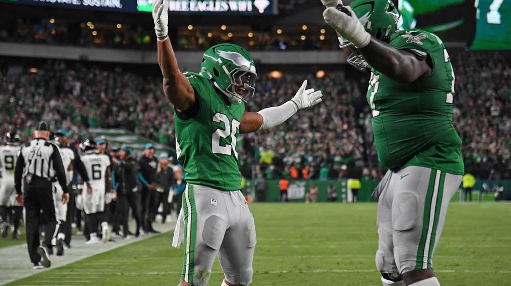 Philadelphia Eagles running back Saquon Barkley (26) leaps backwards over Jacksonville Jaguars cornerback Jarrian Jones (22) at Lincoln Financial Field.