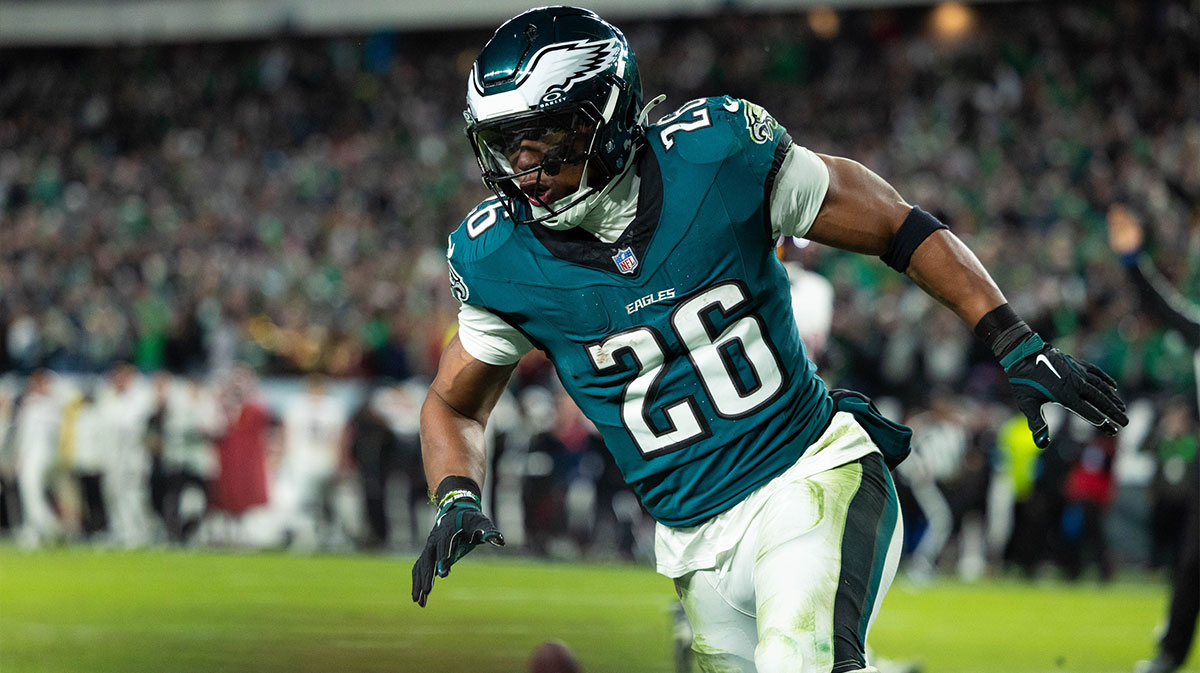 Philadelphia Eagles running back Saquon Barkley (26) reacts after his touchdown run against the Washington Commanders during the fourth quarter at Lincoln Financial Field.