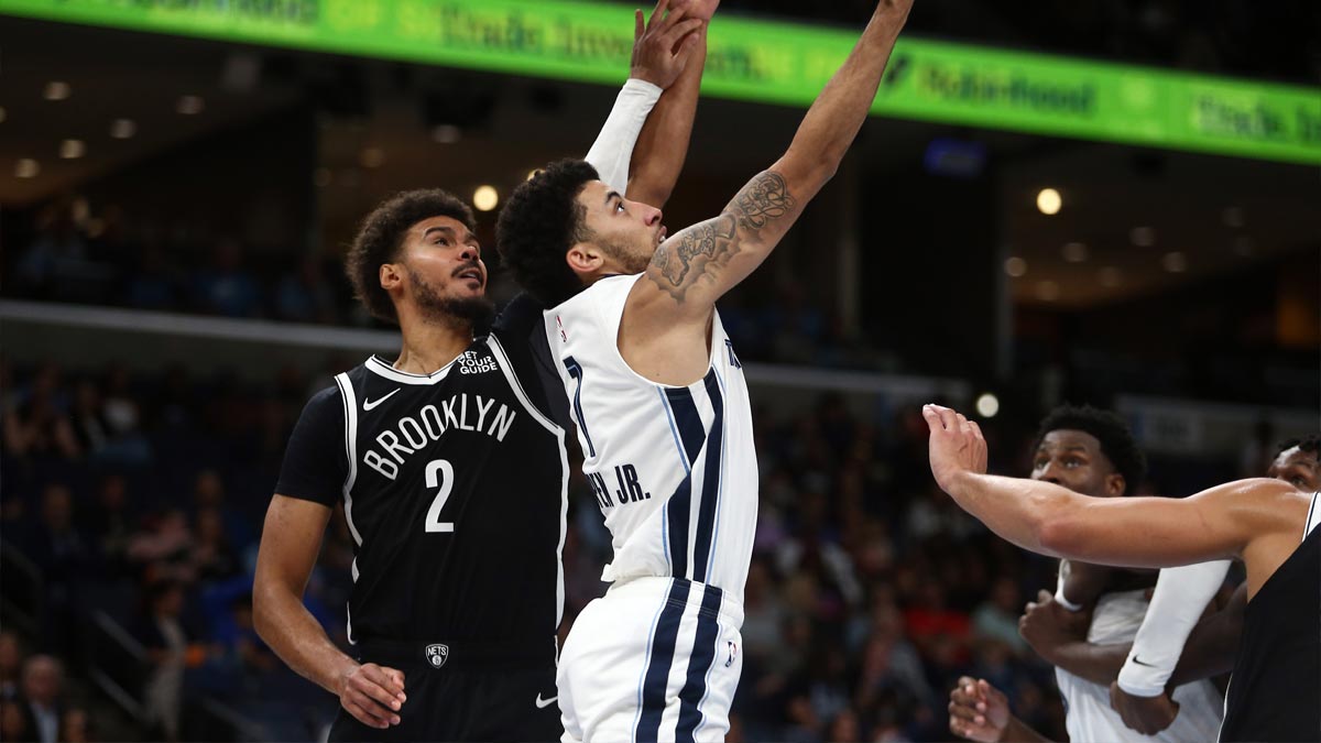 Memphis Grizzlies guard Scotty Pippen Jr. (1) shoots as Brooklyn Nets forward Cameron Johnson (2) defends during the second half at FedExForum.