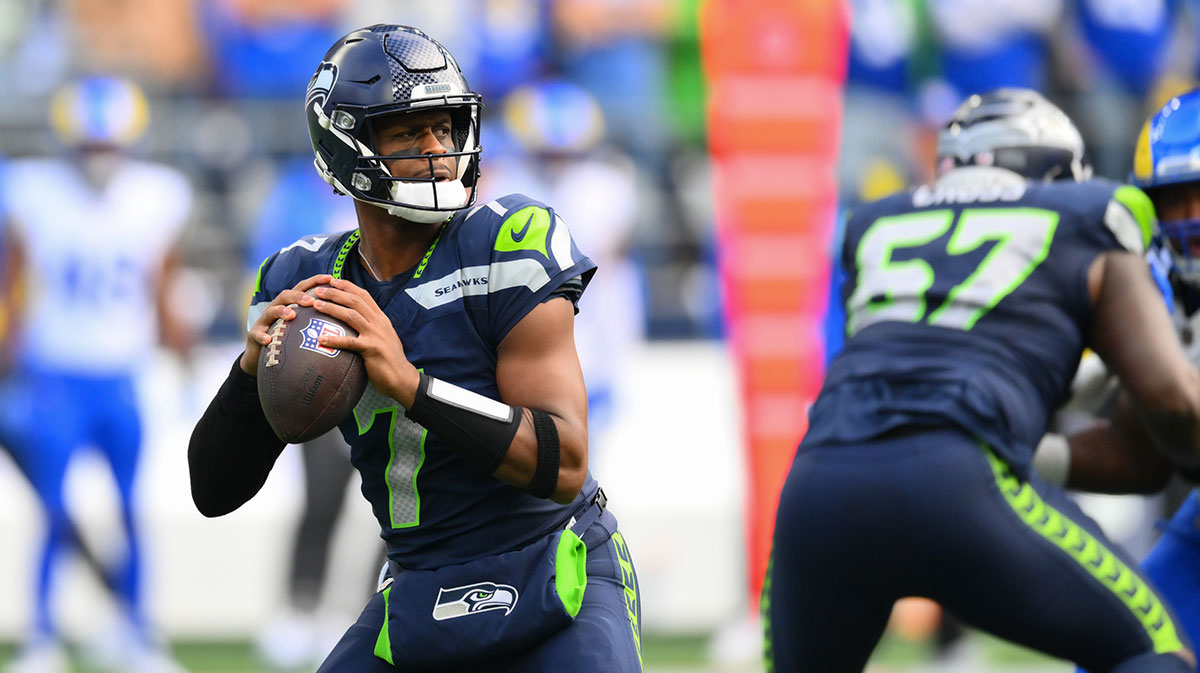 Seattle Seahawks quarterback Geno Smith (7) looks to pass the ball against the Los Angeles Rams during the first half at Lumen Field