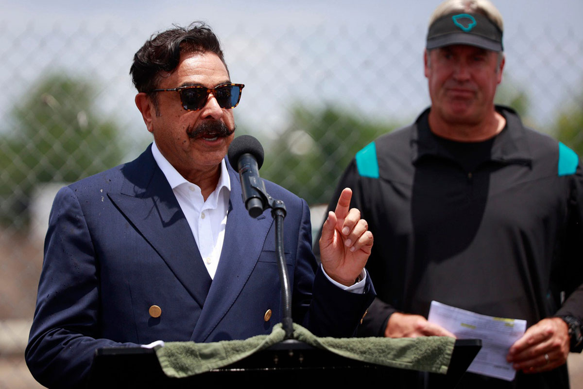 Jacksonville Jaguars owner Shad Khan speaks as Head Coach Doug Pederson listens in as the business bearing the name on the new practice facility, Miller Electric Center, is announced during a media conference after a minicamp football practice Monday, June 13, 2022 at TIAA Bank Field in Jacksonville.