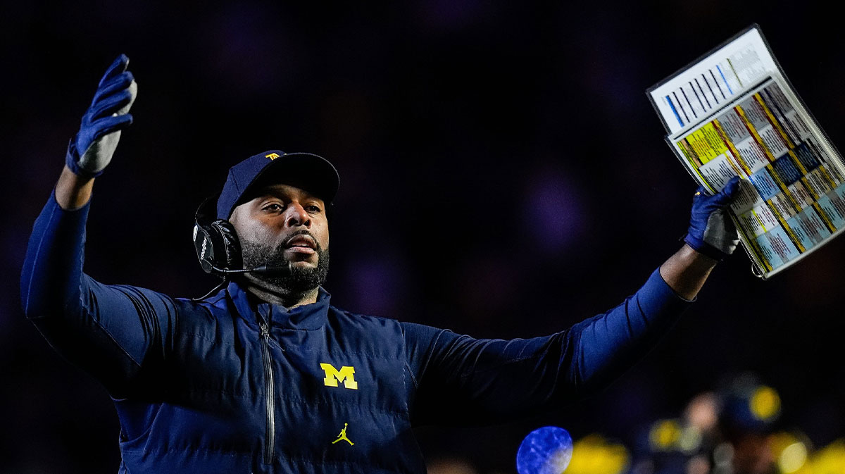 Michigan head coach Sherrone Moore celebrates a touchdown against Michigan State during the second half at Michigan Stadium