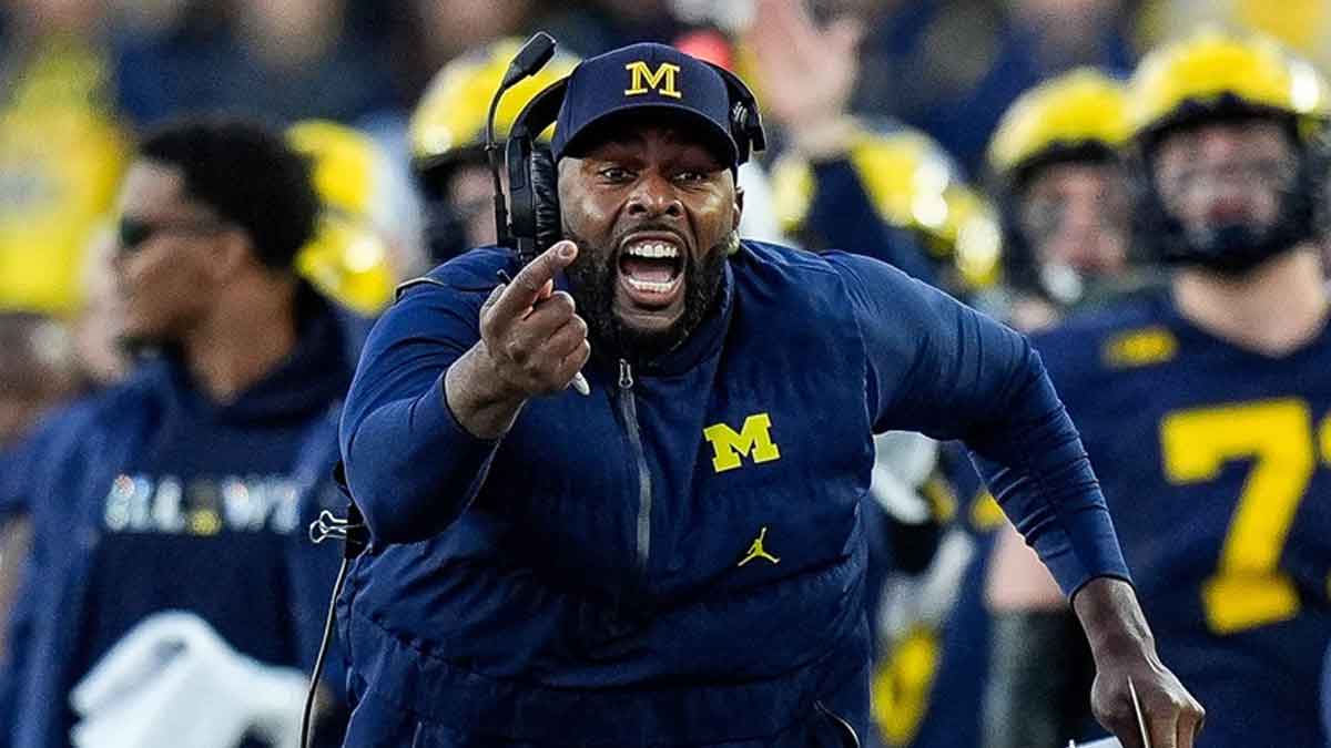Michigan head coach Sherrone Moore challenges an incomplete pass intended for tight end Colston Loveland (not pictured) during the second half against Oregon at Michigan Stadium in Ann Arbor on Saturday, Nov. 2, 2024. Moore lost the challenge.