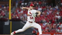 St. Louis Cardinals starting pitcher Sonny Gray (54) pitches against the Pittsburgh Pirates during the second inning at Busch Stadium.