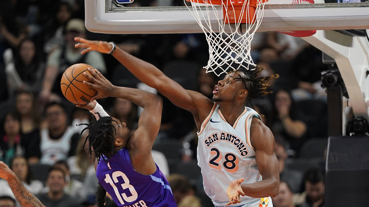 Spurs center Charles Bassey blocks shot