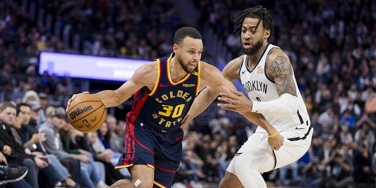 Golden State Warriors guard Stephen Curry (30) drives past Brooklyn Nets forward Trendon Watford (9) during the second half at Chase Center.