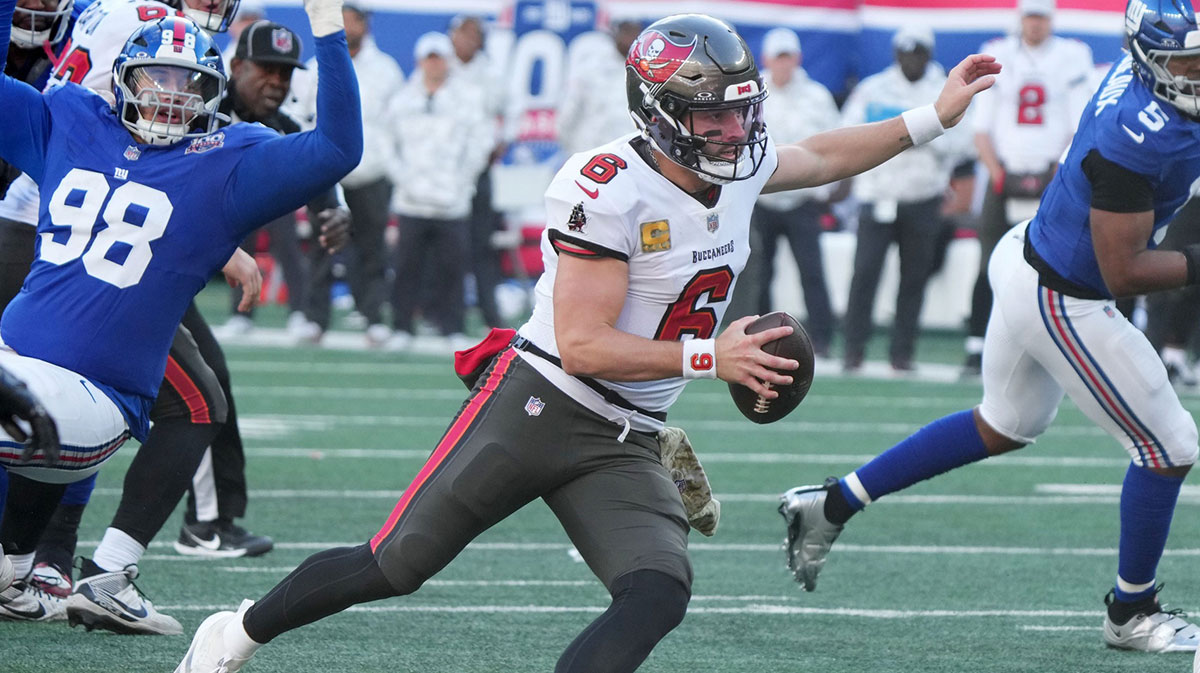 East Rutherford, NJ -- November 24, 2024 -- Baker Mayfield of Tampa Bay runs for a TD late in the first half as the Tampa Bay Buccaneers came to MetLife Stadium to play the New York Giants.