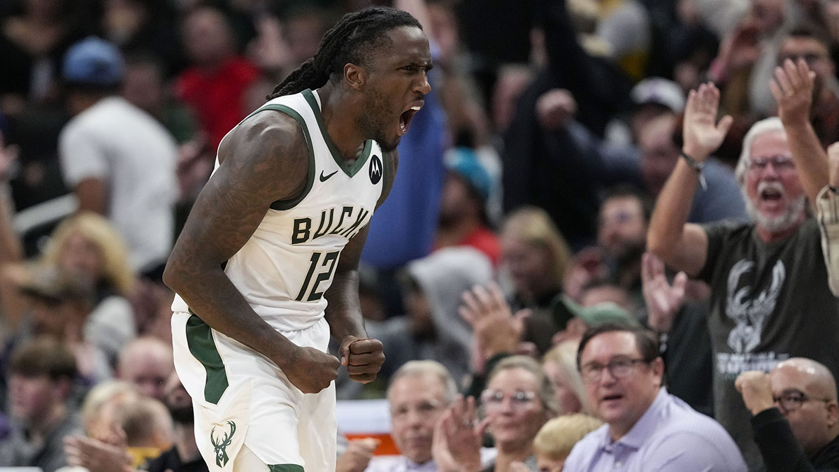 Taurean Prince (12) celebrates after scoring a basket during the fourth quarter against the Detroit Pistons at Fiserv Forum