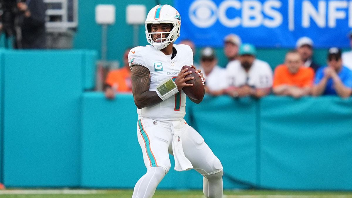 Miami Dolphins quarterback Tua Tagovailoa (1) drops back with the ball during the second half against the New England Patriots at Hard Rock Stadium.