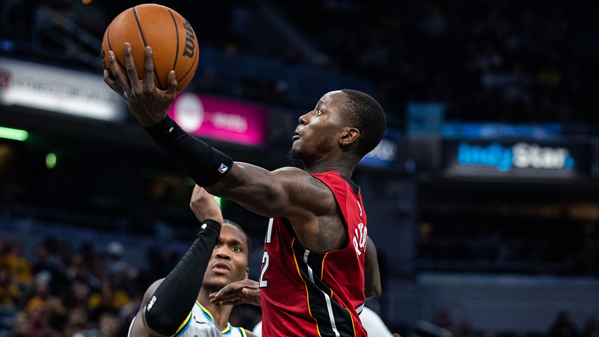 Miami Heat guard Terry Rozier (2) shoots the ball while Indiana Pacers guard Bennedict Mathurin (00) defends in the second half at Gainbridge Fieldhouse.