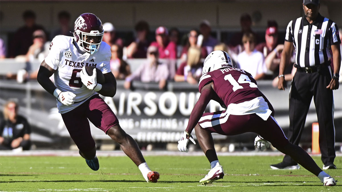 Texas A&M Aggies wide receiver Cyrus Allen (6) runs the ball against Mississippi State Bulldogs cornerback Brice Pollock (14) during the first quarter at Davis Wade Stadium at Scott Field
