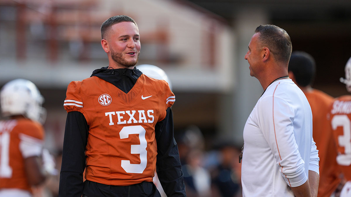 Texas Longhorns quarterback Quinn Ewers (3) talks with head coach Steve Sarkisian before the game against Louisiana Monroe Warhawks at Darrell K Royal-Texas Memorial Stadium.