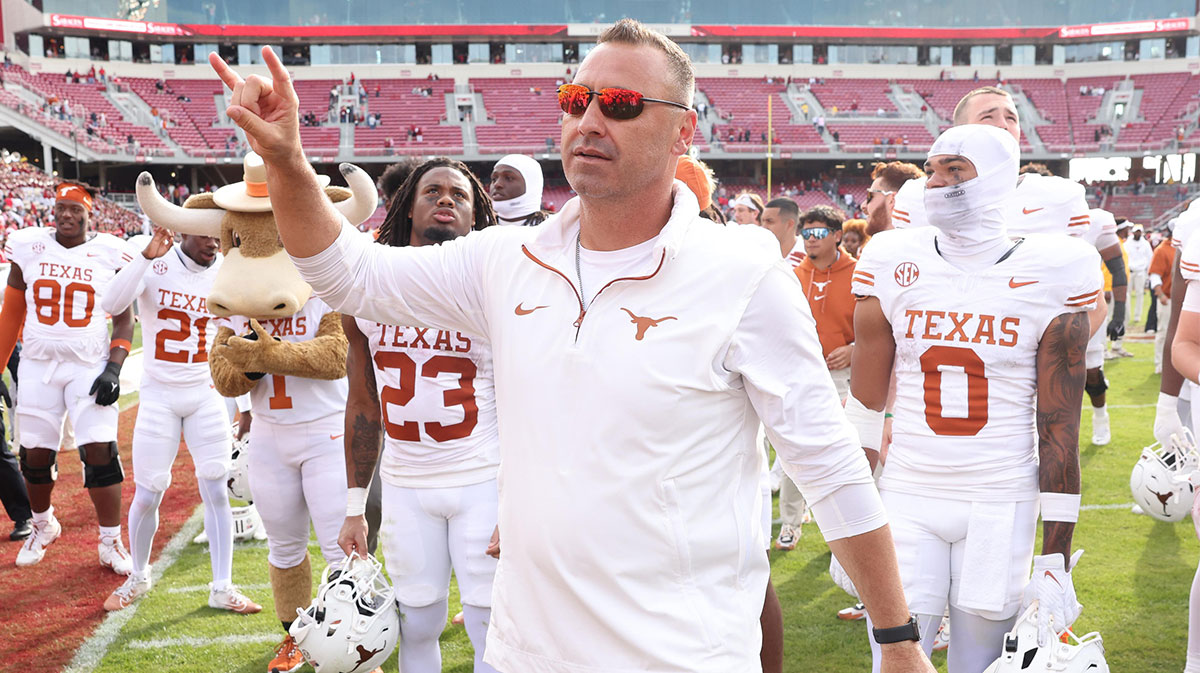 Texas Longhorns head coach Steve Sarkisian celebrates after the game against the Arkansas Razorbacks at Donald W. Reynolds Razorback Stadium. Texas won 20-10.