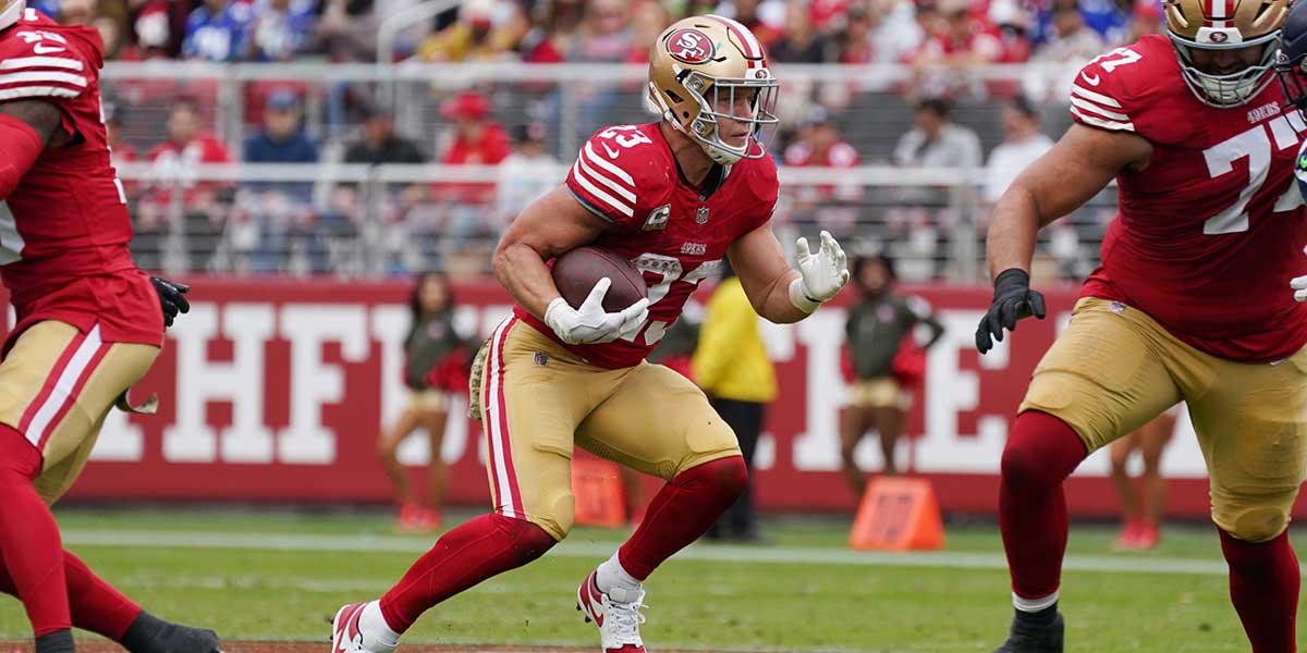 San Francisco 49ers running back Christian McCaffrey (23) rushes the ball against the Seattle Seahawks in the second quarter at Levi's Stadium. 