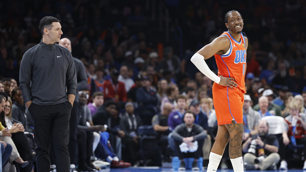 Thunder head coach Mark Daigneault and forward Jalen Williams (8) smile during a time out against the Houston Rockets during the second quarter at Paycom Center
