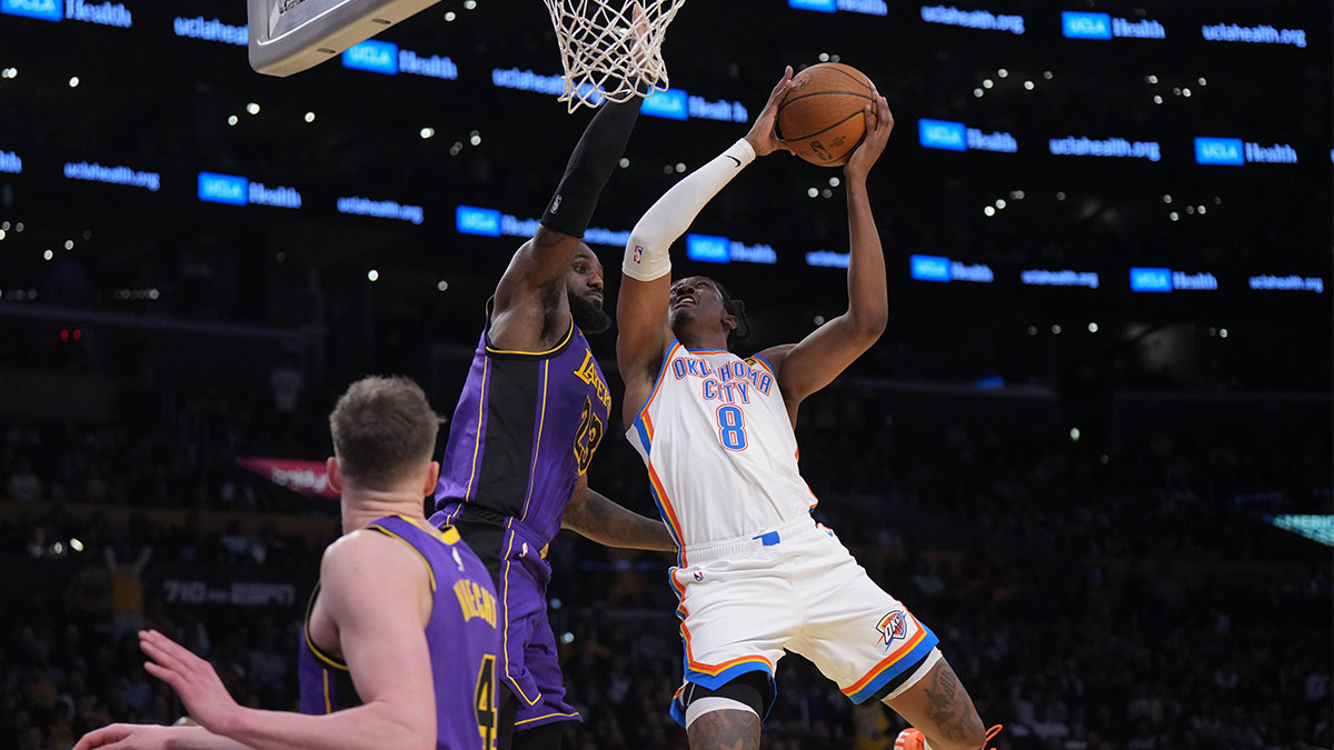 Thunder forward Jalen Williams (8) shoots the ball against Los Angeles Lakers forward LeBron James (23) in the second half at Crypto.com Arena