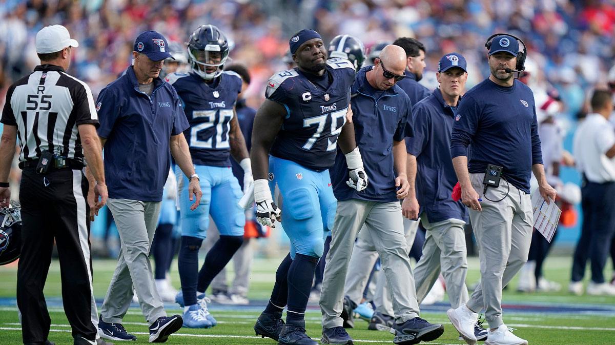 Tennessee Titans center Lloyd Cushenberry III (79) limps off the field at Nissan Stadium in Nashville, Tenn., Sunday, Nov. 3, 2024.
