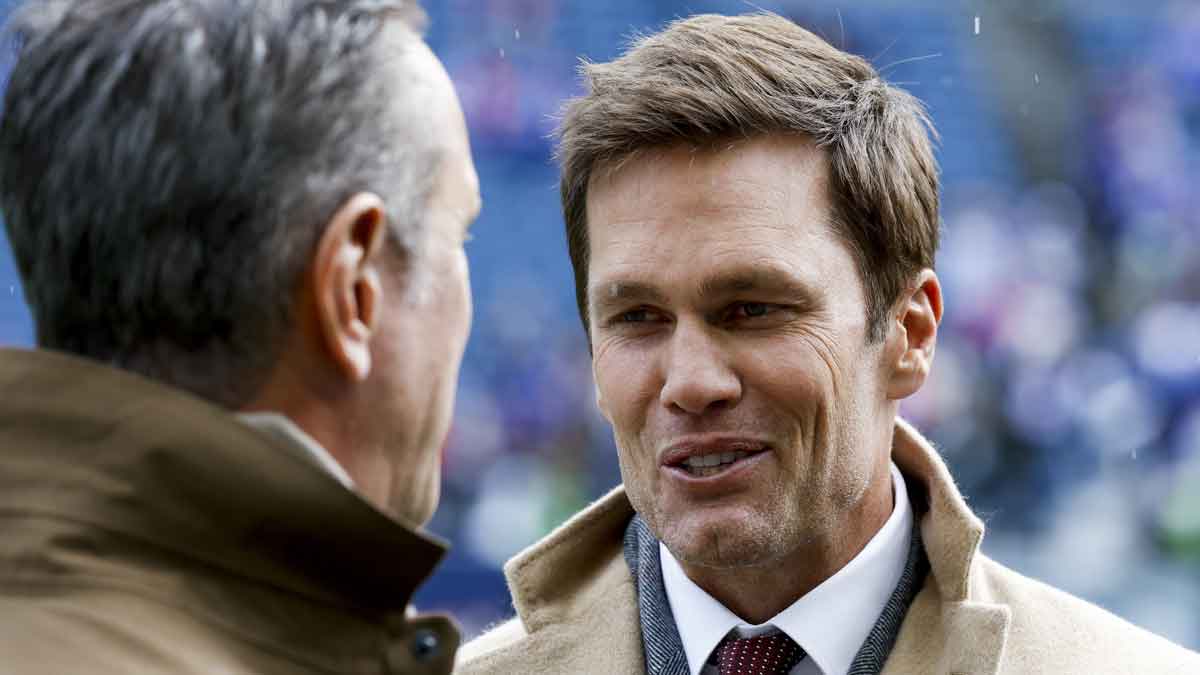 FOX commentator Tom Brady talks during pregame warmups before a game between the Seattle Seahawks and Buffalo Bills at Lumen Field.