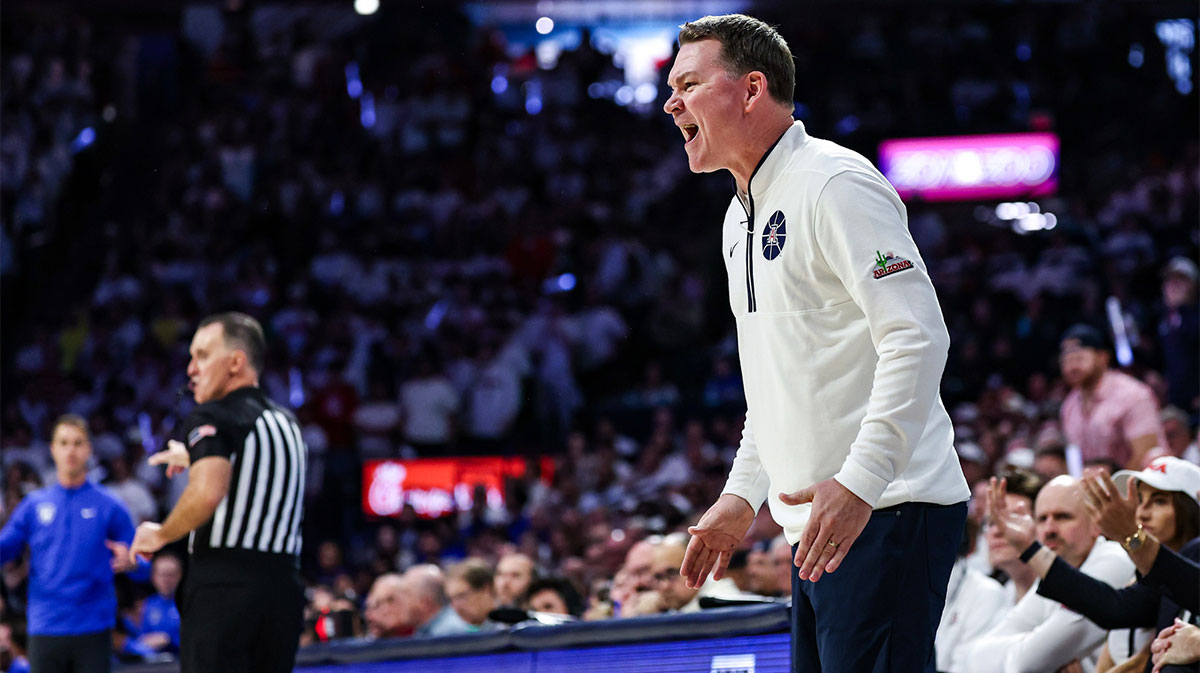 Arizona Wildcats head coach Tommy Lloyd yells toward team during the first half against the Duke Blue Devils at McKale Center.