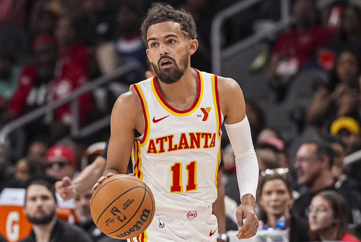 Atlanta Hawks Guard Trae Young (11) control the ball against Chicago bulls during the first half of the State Farm Arena.