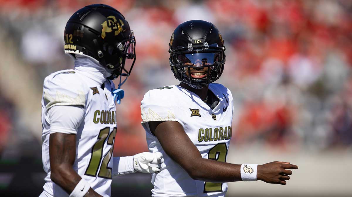 Colorado Buffalos quarterback Shedeur Sanders (2) with wide receiver Travis Hunter (12) against the Arizona Wildcats at Arizona Stadium.