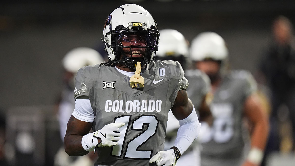 Colorado Buffaloes wide receiver Travis Hunter (12) reacts after touchdown reception in the first quarter against the Cincinnati Bearcats at Folsom Field.
